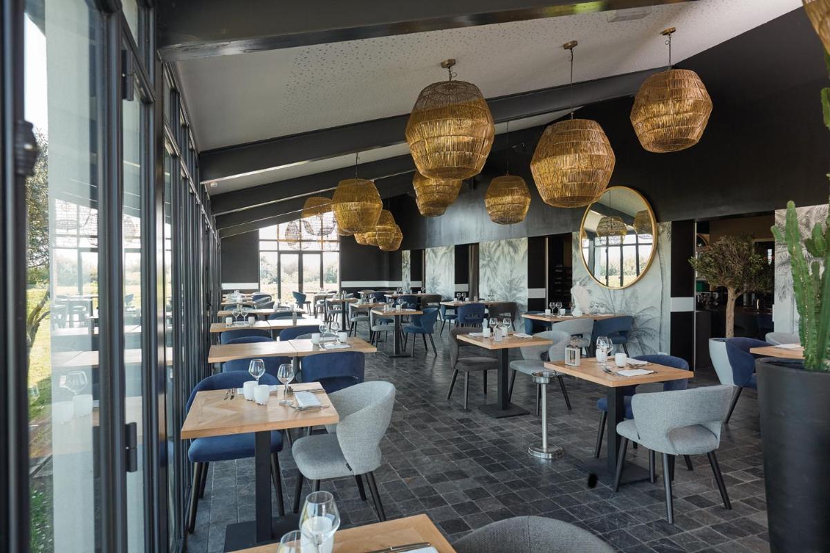 Restaurant ou autre lieu de restauration dans l'établissement Hôtel Atalante - Relais Thalasso & Spa
