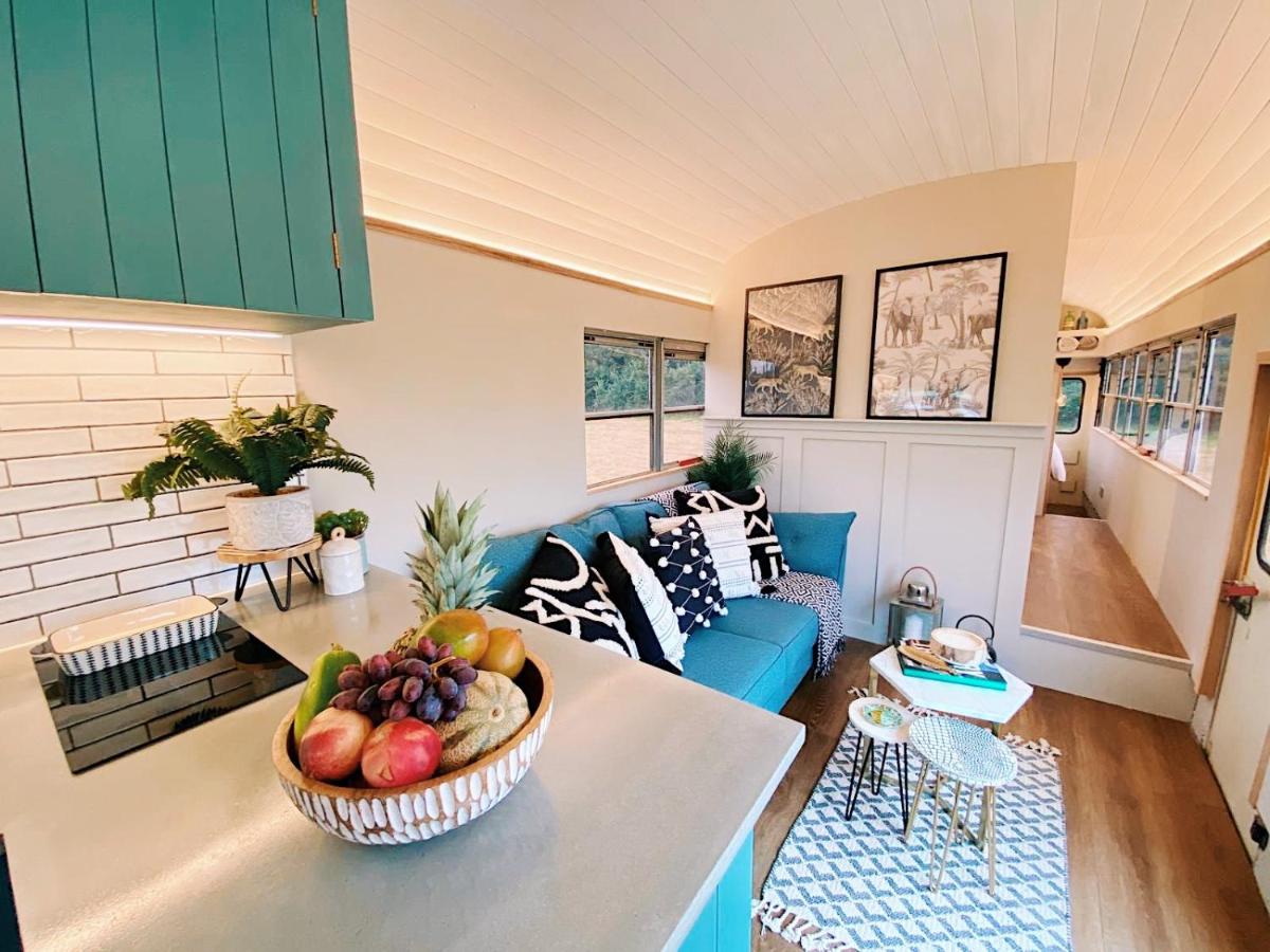 American School Bus Retreat with Hot Tub in Sussex Meadow - Housity