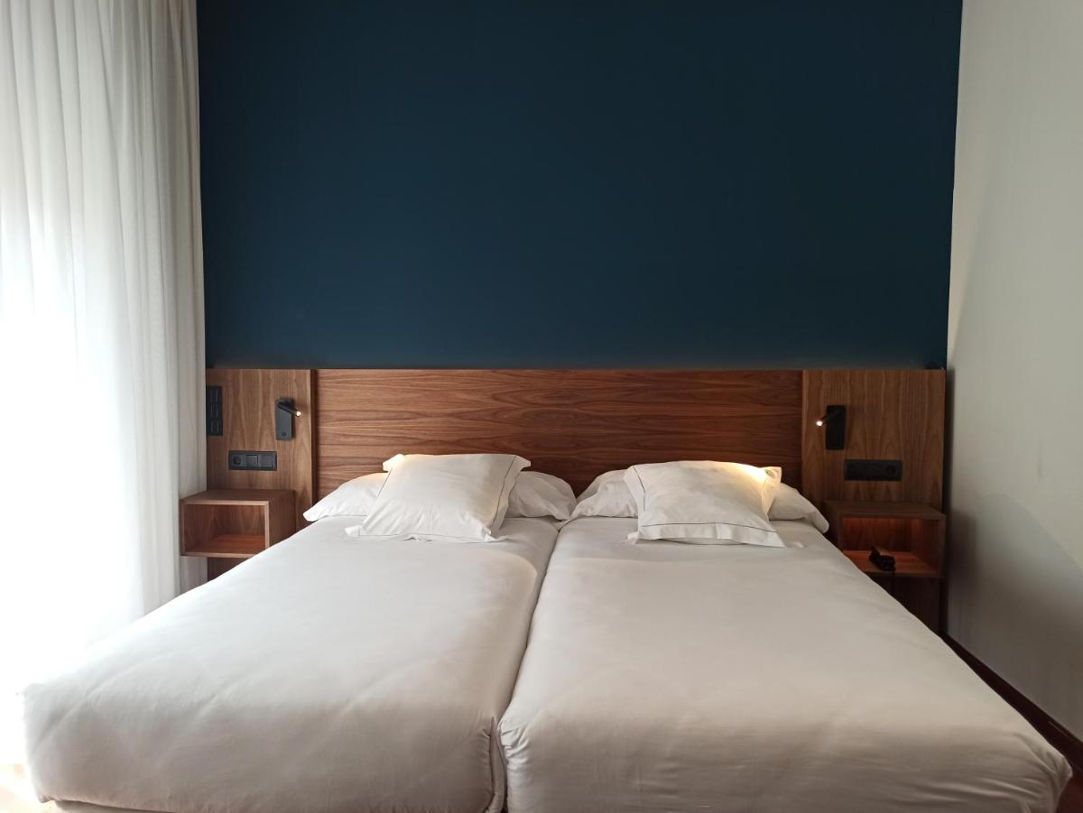 Cama o camas de una habitación en ARVA Spa París
