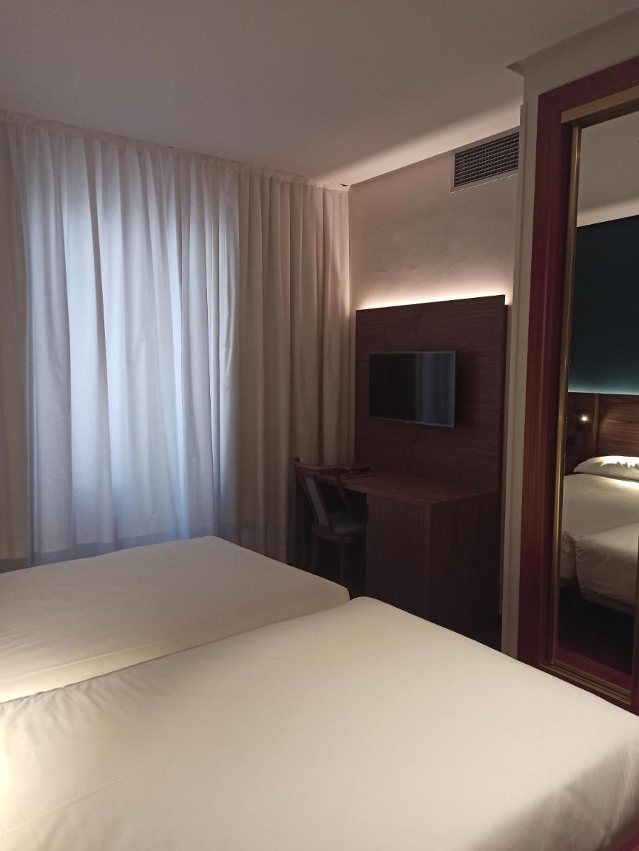 Cama o camas de una habitación en ARVA Spa París