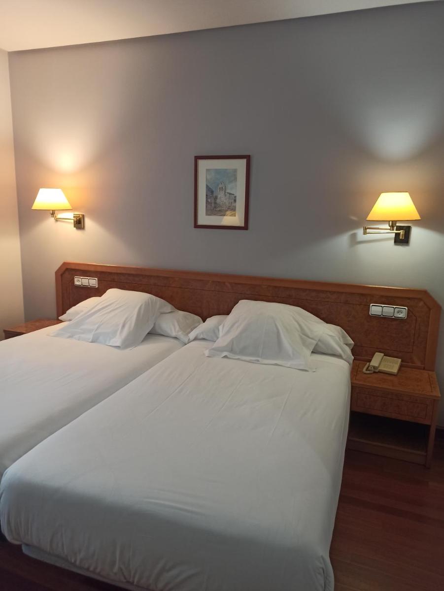 Cama o camas de una habitación en ARVA Spa París
