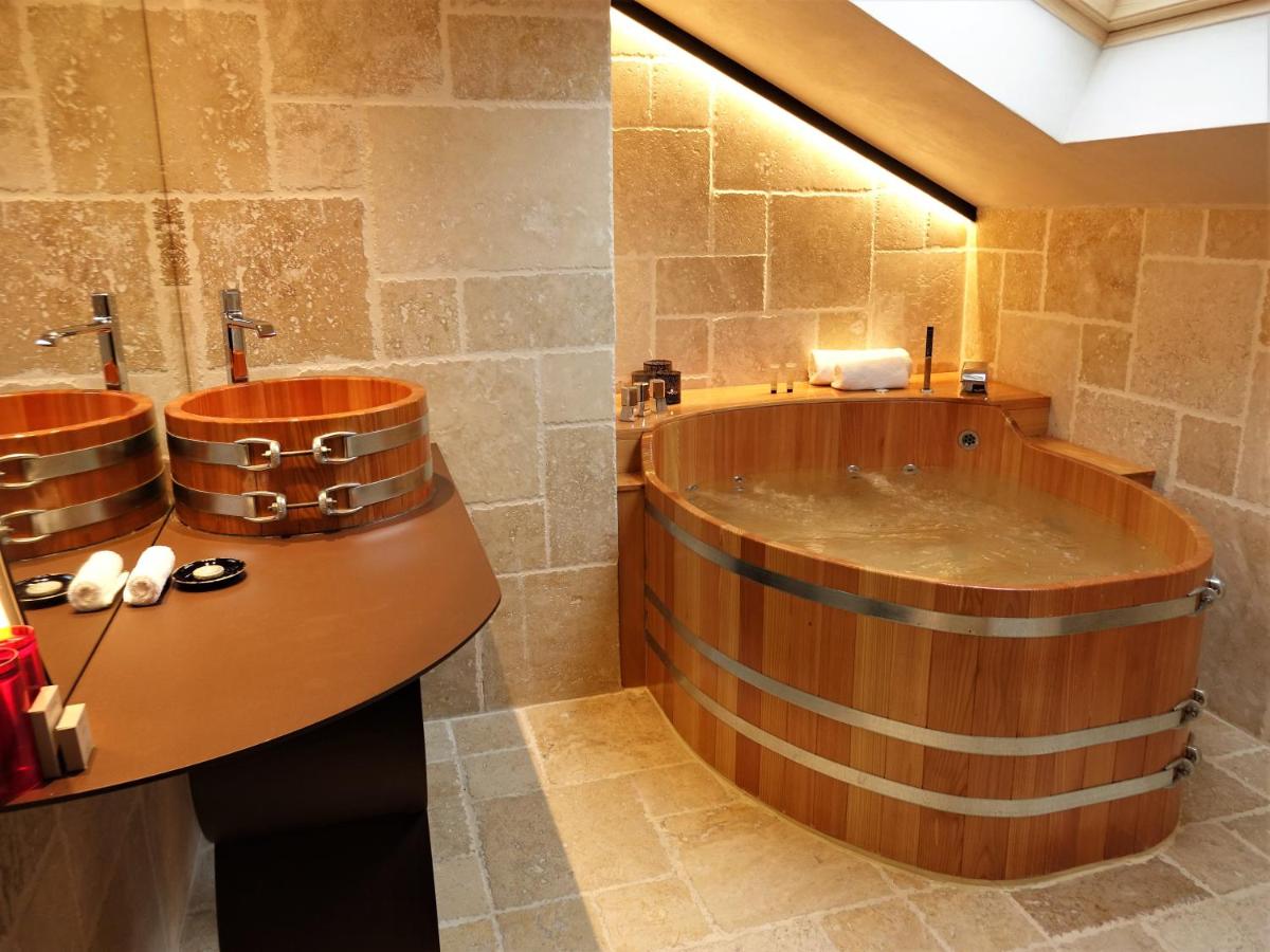 Photo de la galerie de l'établissement Domaine du Haut Jardin Hôtel & Chalets Spa Privé, à Rehaupal