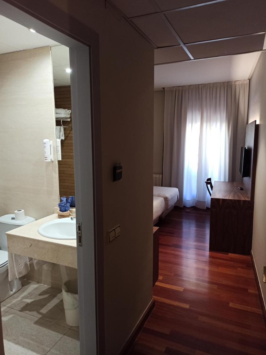 Cama o camas de una habitación en ARVA Spa París