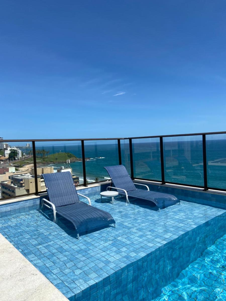 Apartamento novo com vista mar no Smart Barra SSA - Housity