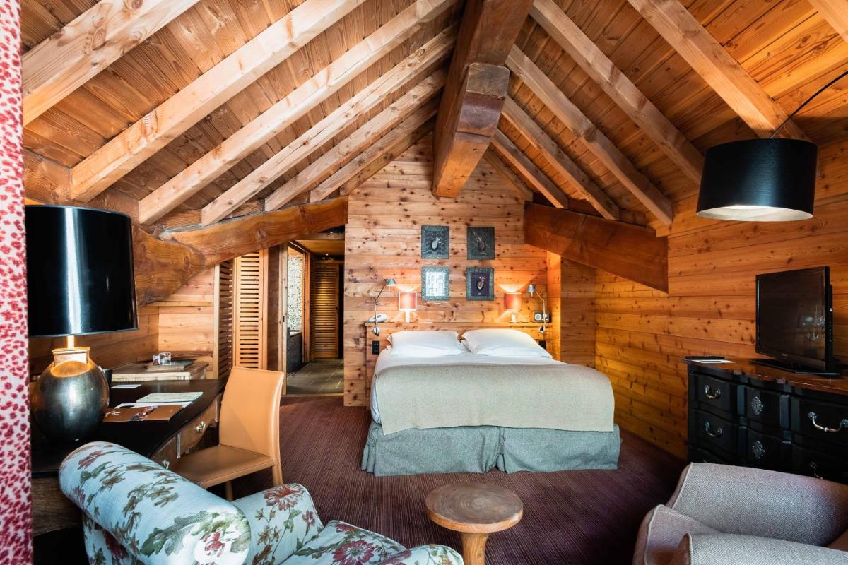 Un ou plusieurs lits dans un hébergement de l'établissement Hôtel LE BLIZZARD
