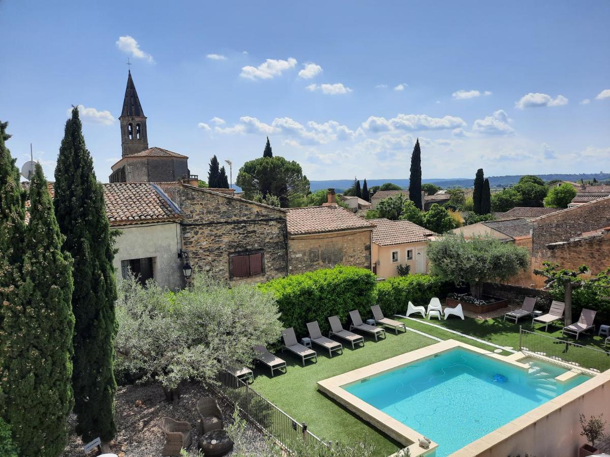 L'Ostal Saint Hilaire d'Ozilhan - Bed & Breakfast - Housity