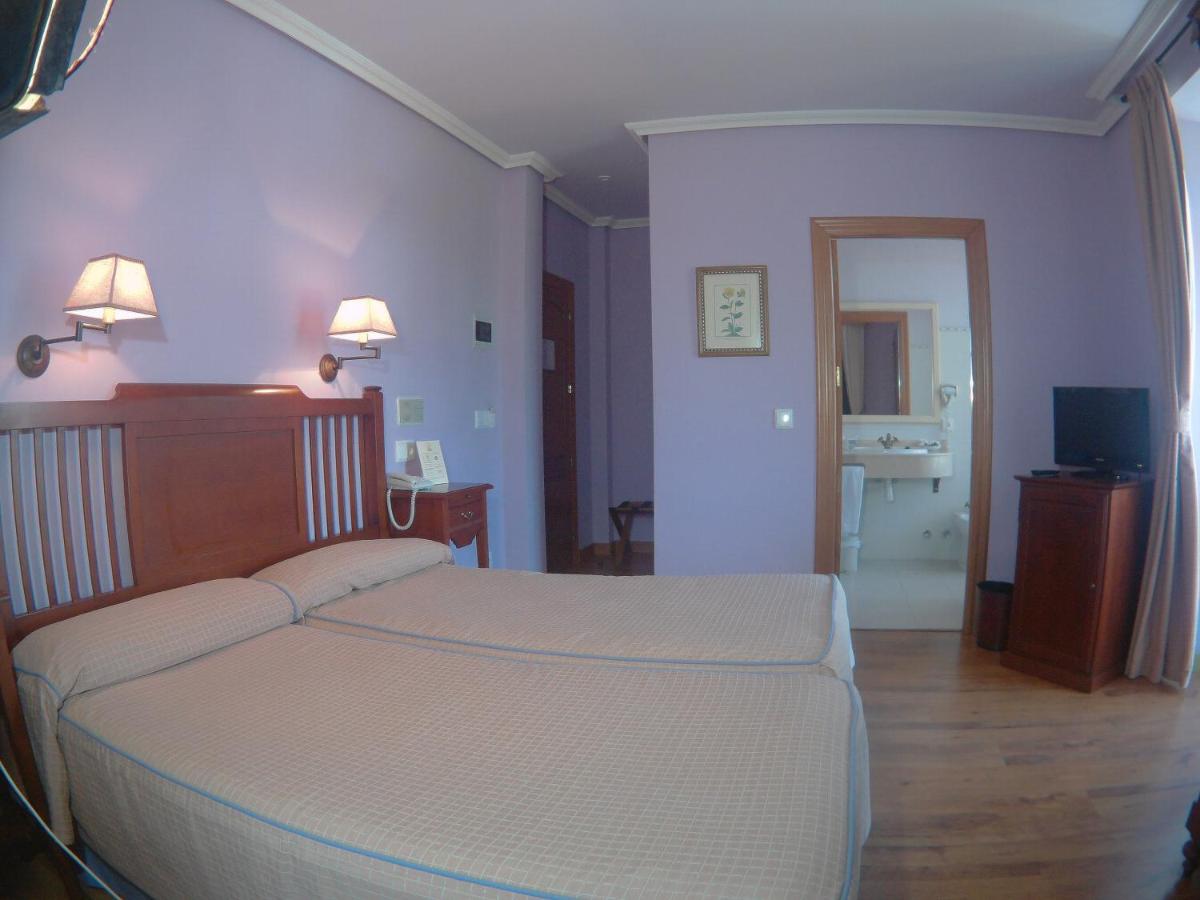 Cama o camas de una habitación en Silken Spa La Hacienda De Don Juan