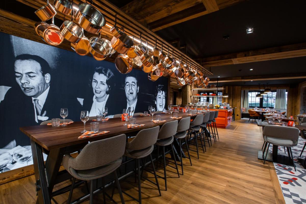 Restaurant ou autre lieu de restauration dans l'établissement Hôtel Névé