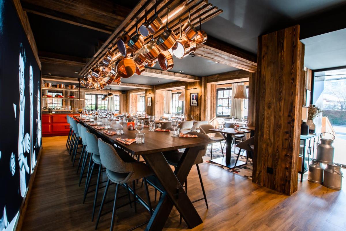 Restaurant ou autre lieu de restauration dans l'établissement Hôtel Névé