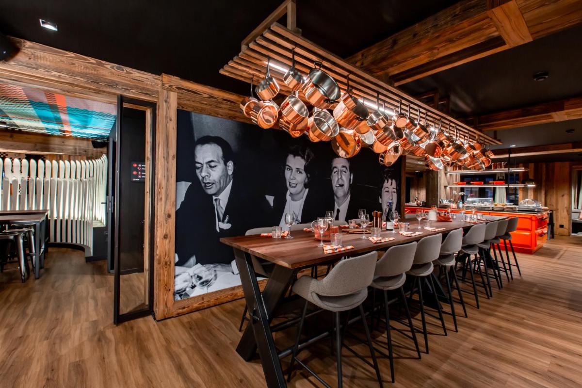 Restaurant ou autre lieu de restauration dans l'établissement Hôtel Névé
