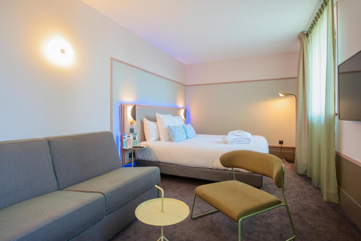 Un ou plusieurs lits dans un hébergement de l'établissement Aiden by Best Western Clermont-Ferrand Hotel & Spa