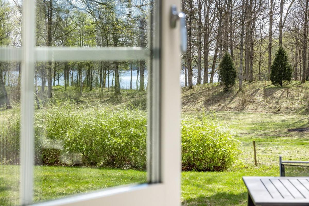 Holiday house with lake view of Bolmen - Housity
