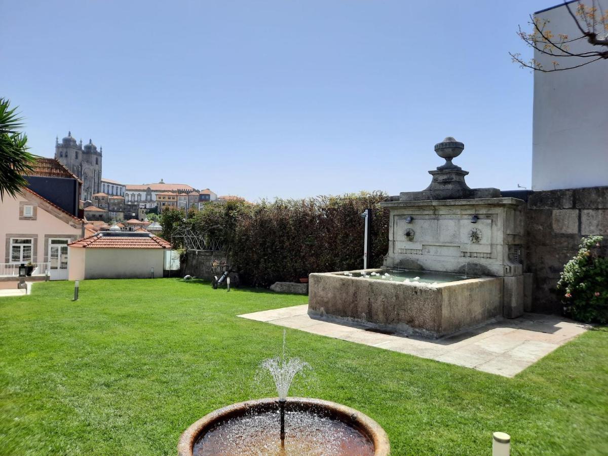 Um jardim no exterior de Oca Flores Hotel Boutique