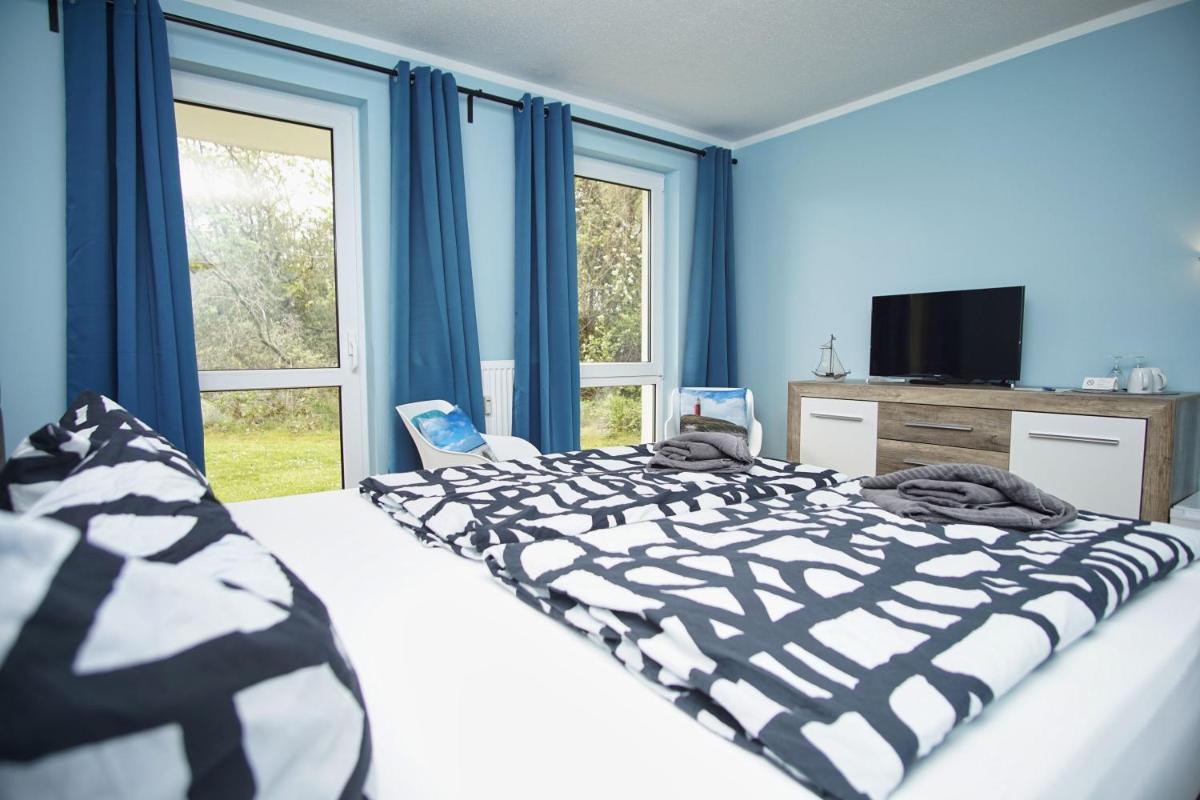 Suitetrails - F-1010 Strandhaus Mönchgut Bed&Breakfast DZ 25 Garten, strandnah, inkl Frühstück
