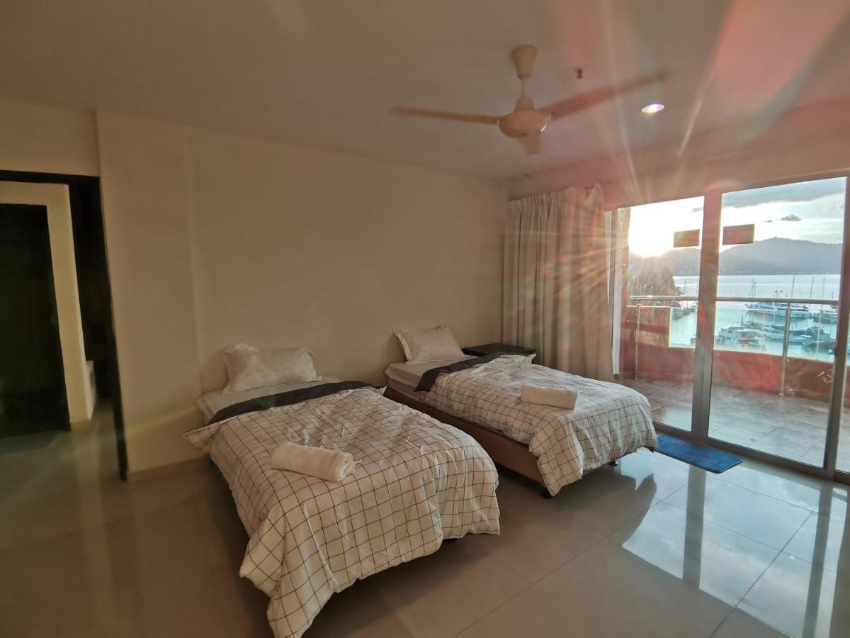 Suitetrails - Spacious & Homey Apartment at Marina Island by JoMy Homestay