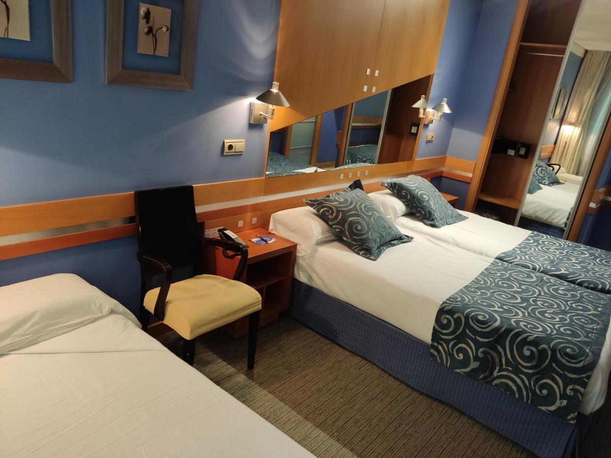 Cama o camas de una habitación en Hotel Torresport