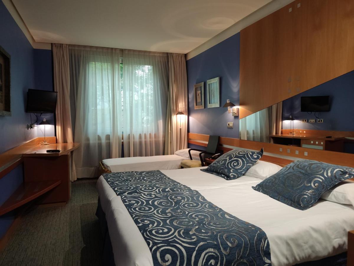 Cama o camas de una habitación en Hotel Torresport