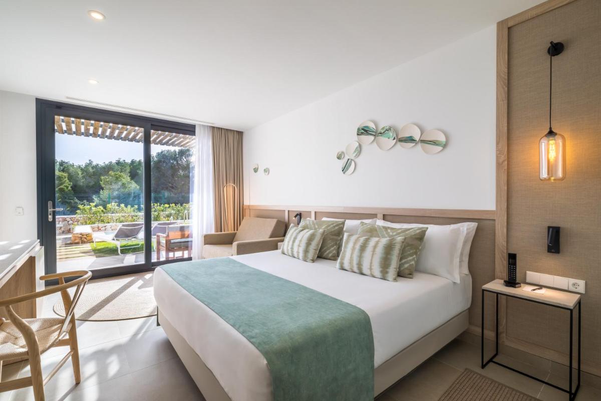 Cama o camas de una habitación en Barceló Nura