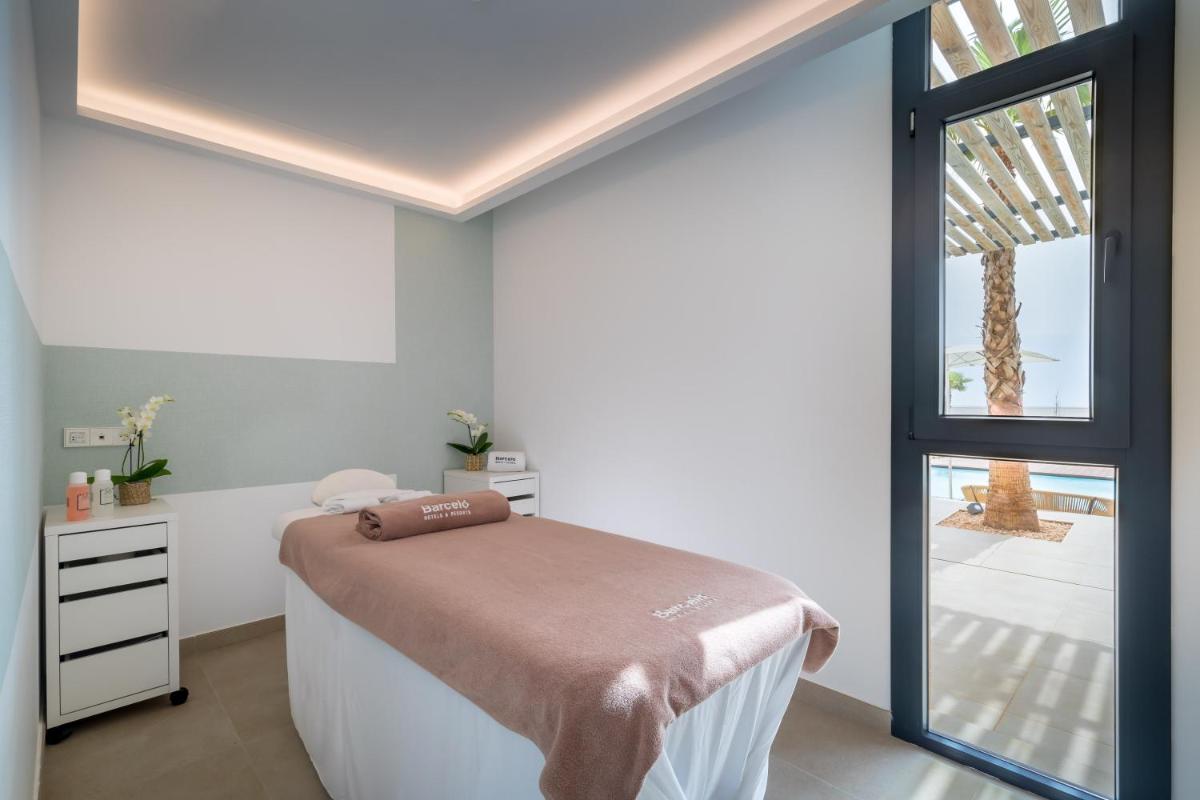 Cama o camas de una habitación en Barceló Nura