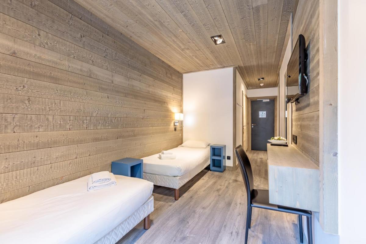 Un ou plusieurs lits dans un hébergement de l'établissement Victoria Lodge, Friendly Hotel