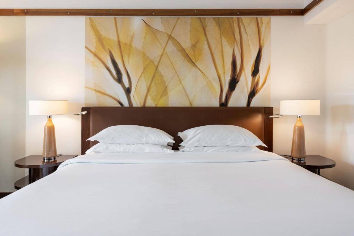 Uma cama ou camas num quarto em Terra Nostra Garden Hotel