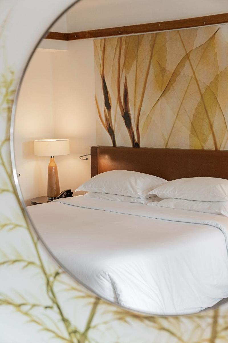 Uma cama ou camas num quarto em Terra Nostra Garden Hotel
