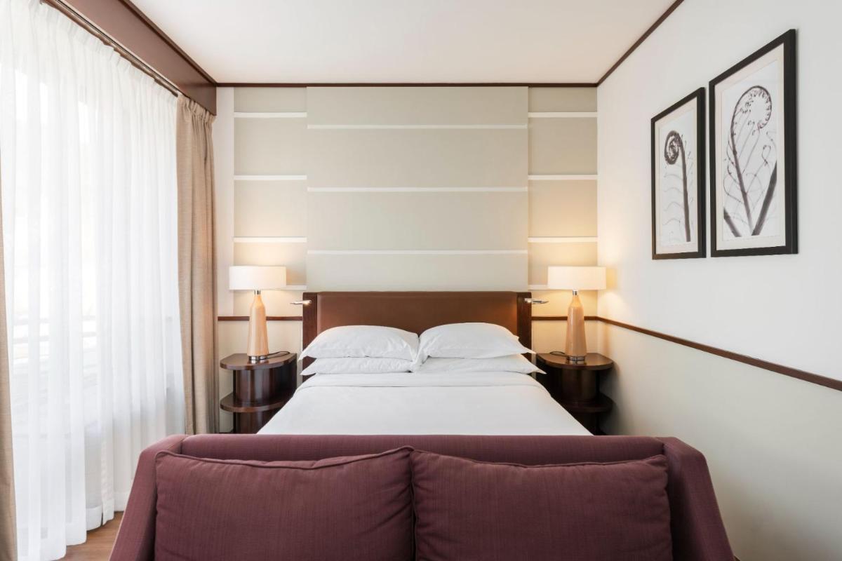Uma cama ou camas num quarto em Terra Nostra Garden Hotel