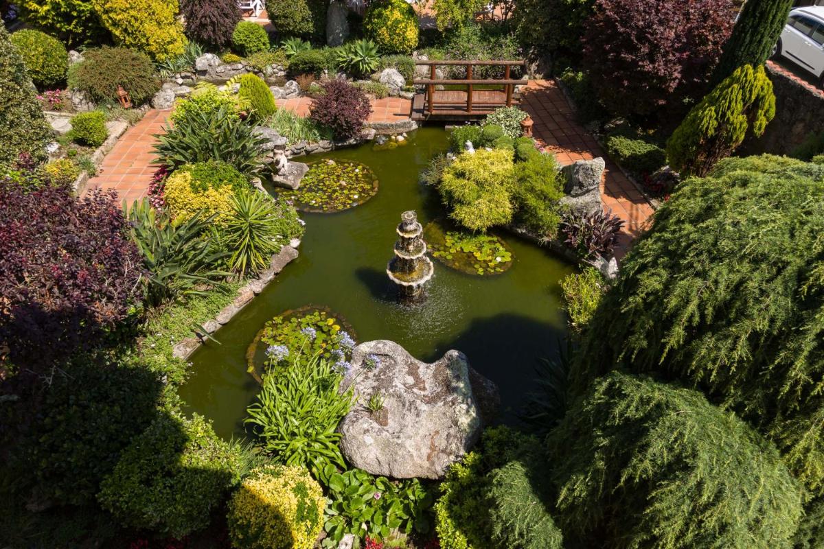 Jardín al aire libre en Hotel Spa Bosque mar