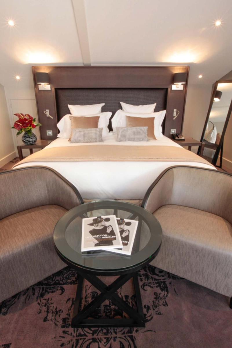 Un ou plusieurs lits dans un hébergement de l'établissement La Cour des Consuls Hotel & Spa Toulouse - MGallery Collection