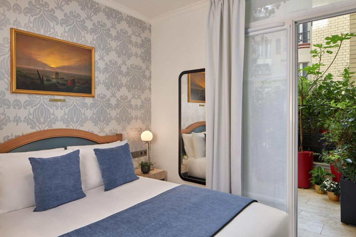 Un ou plusieurs lits dans un hébergement de l'établissement Hotel Villa Romantic & Spa