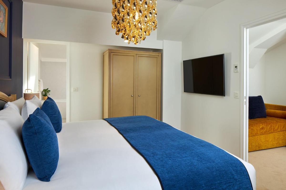 Un ou plusieurs lits dans un hébergement de l'établissement Hotel Villa Romantic & Spa