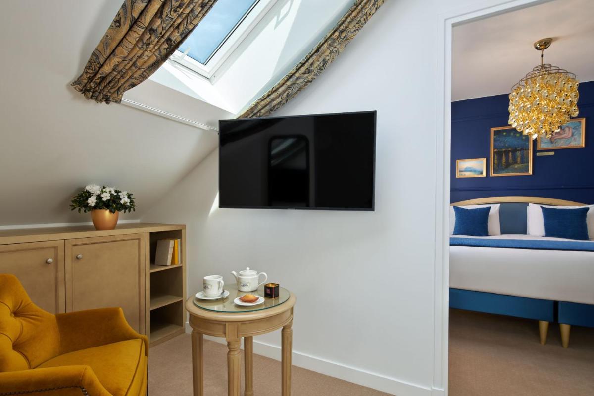 Télévision ou salle de divertissement dans l'établissement Hotel Villa Romantic & Spa