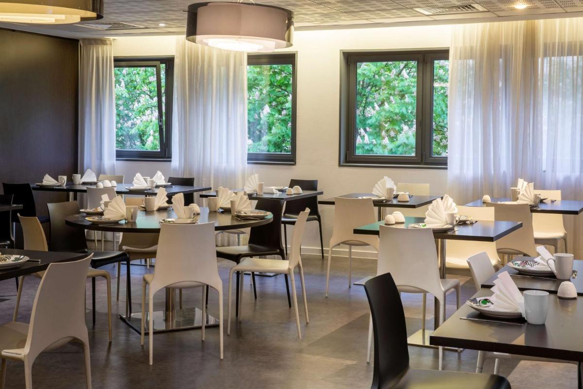 Restaurant ou autre lieu de restauration dans l'établissement Best Western Plus Thionville Centre