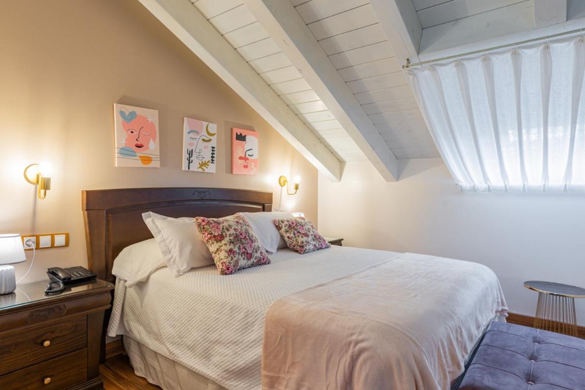 Cama o camas de una habitación en Hotel & Spa María Manuela