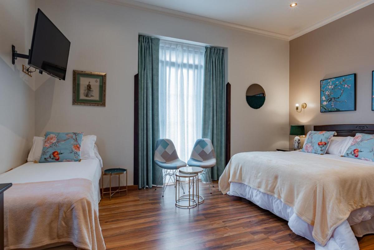 Cama o camas de una habitación en Hotel & Spa María Manuela
