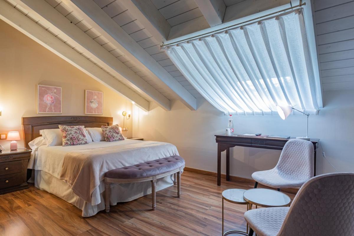 Cama o camas de una habitación en Hotel & Spa María Manuela