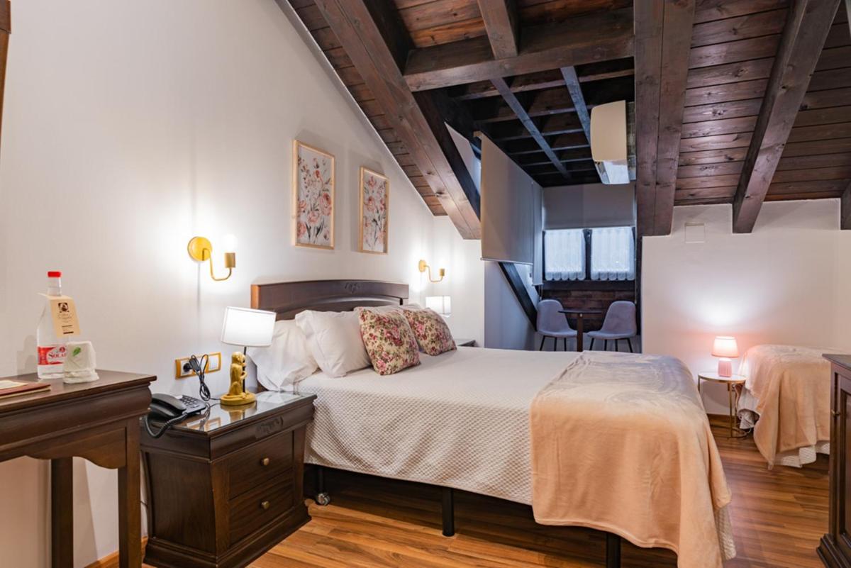 Cama o camas de una habitación en Hotel & Spa María Manuela