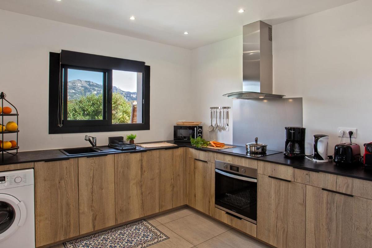 Suitetrails - apart Levante shared swimming pool bbq