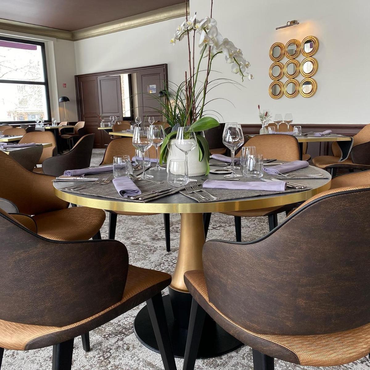Coin salon dans l'établissement Hôtel Beau Rivage