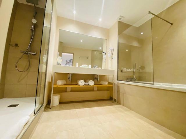 Salle de bains dans l'établissement Palmyra Golf Hotel & Spa