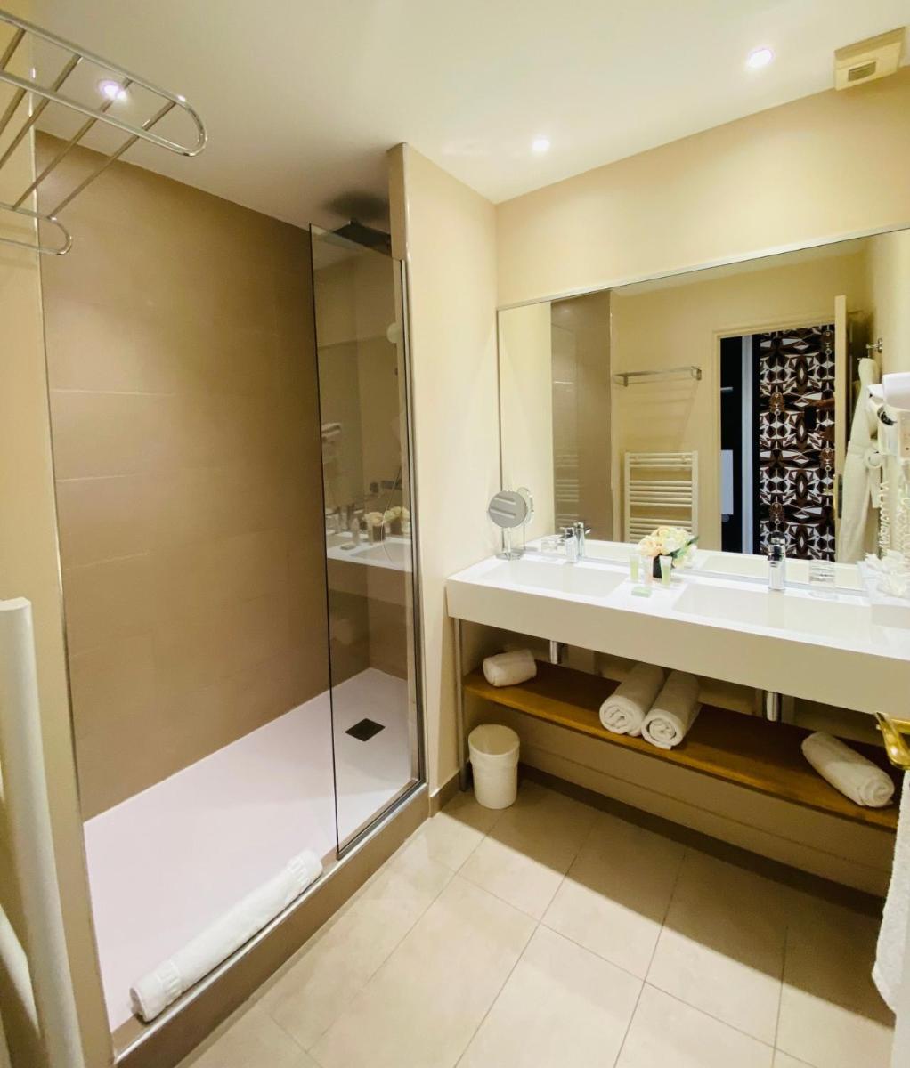 Salle de bains dans l'établissement Palmyra Golf Hotel & Spa