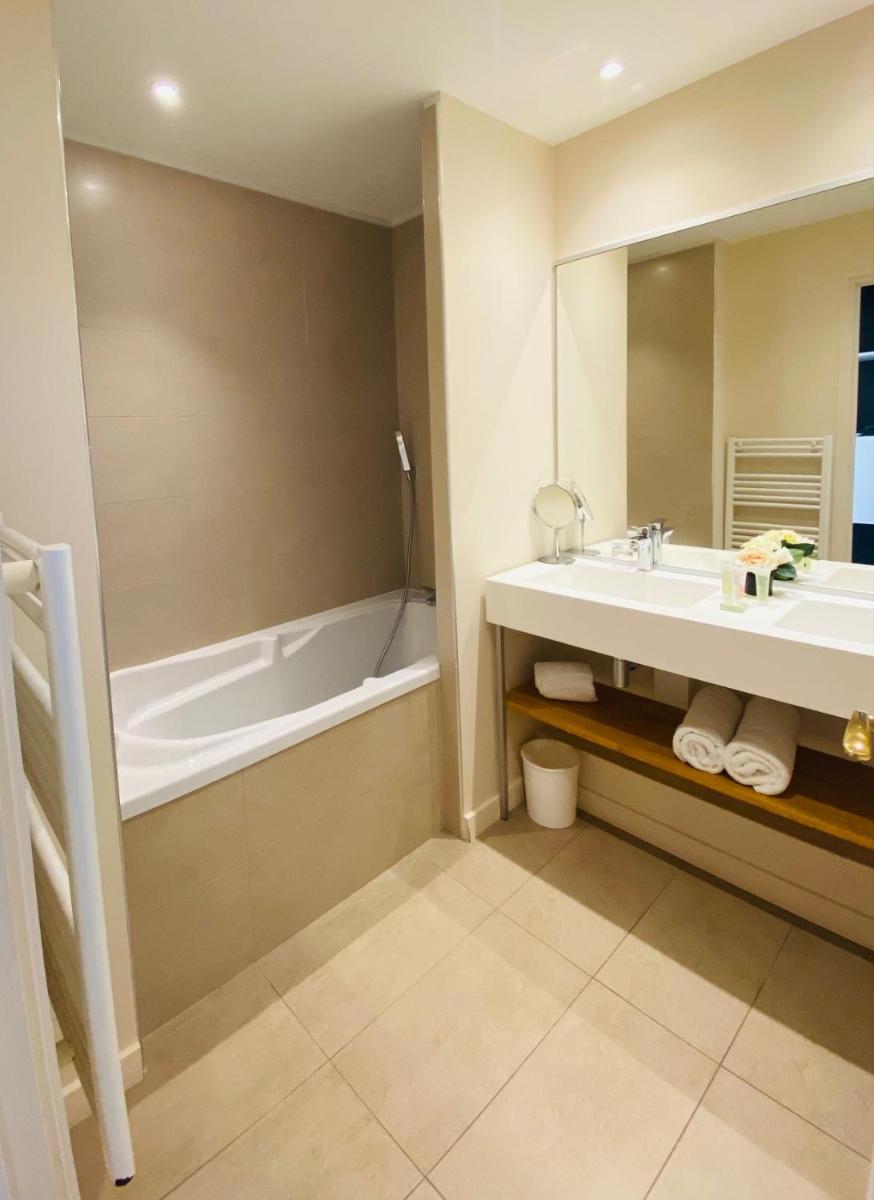 Salle de bains dans l'établissement Palmyra Golf Hotel & Spa