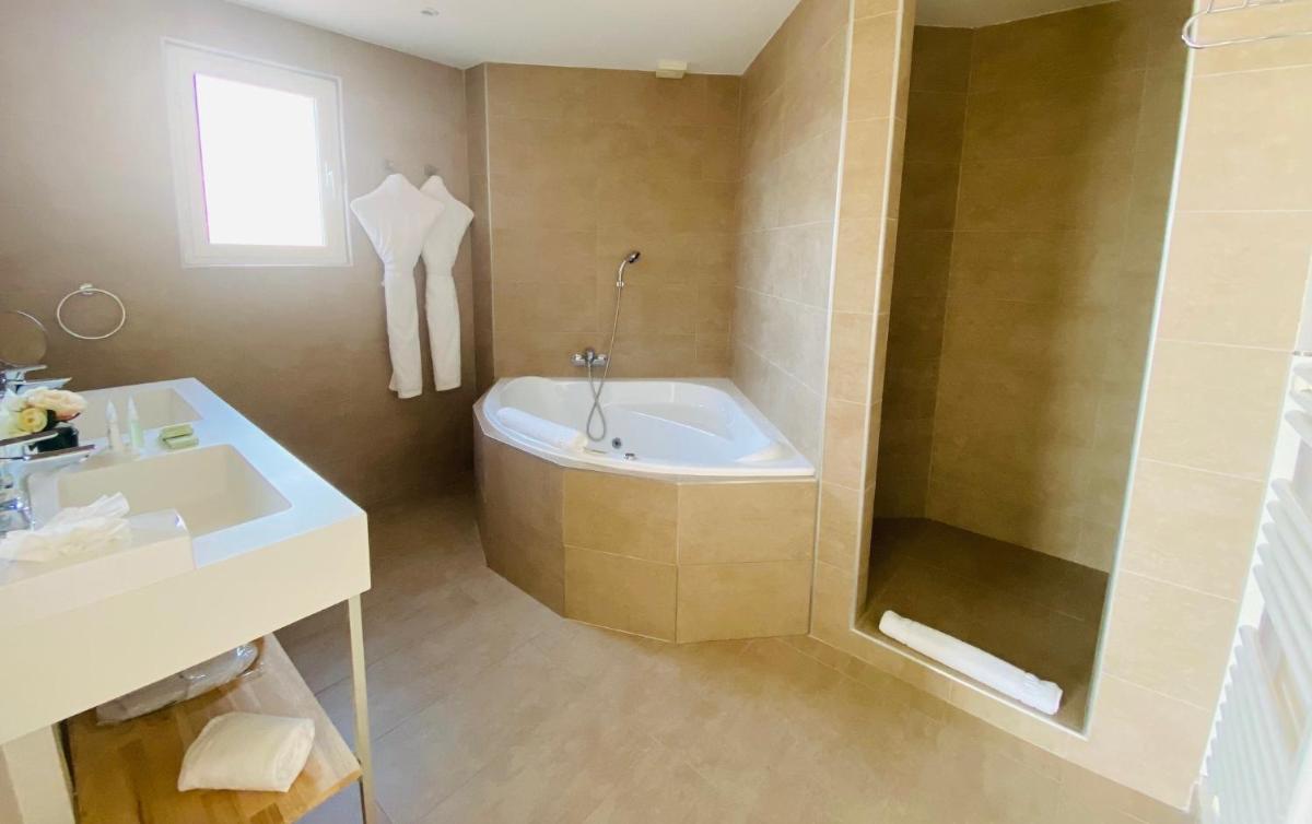 Salle de bains dans l'établissement Palmyra Golf Hotel & Spa