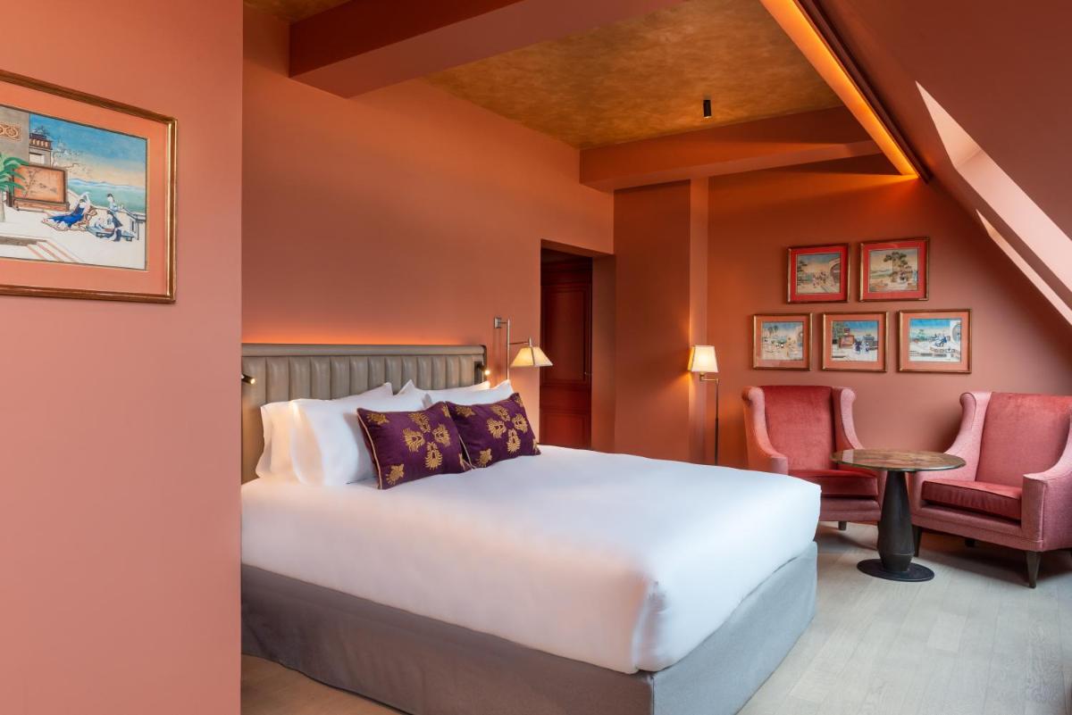 Un ou plusieurs lits dans un hébergement de l'établissement Hotel de Montesquieu