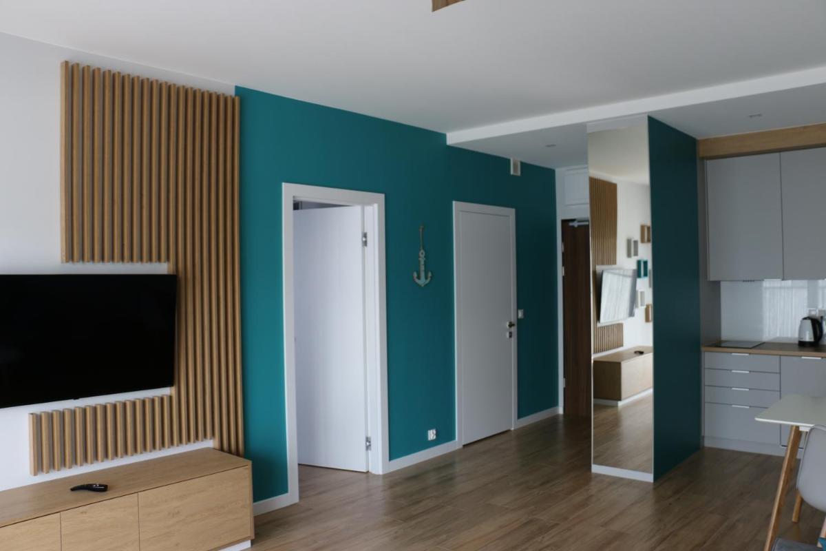 Turkusowa Liwia - Housity