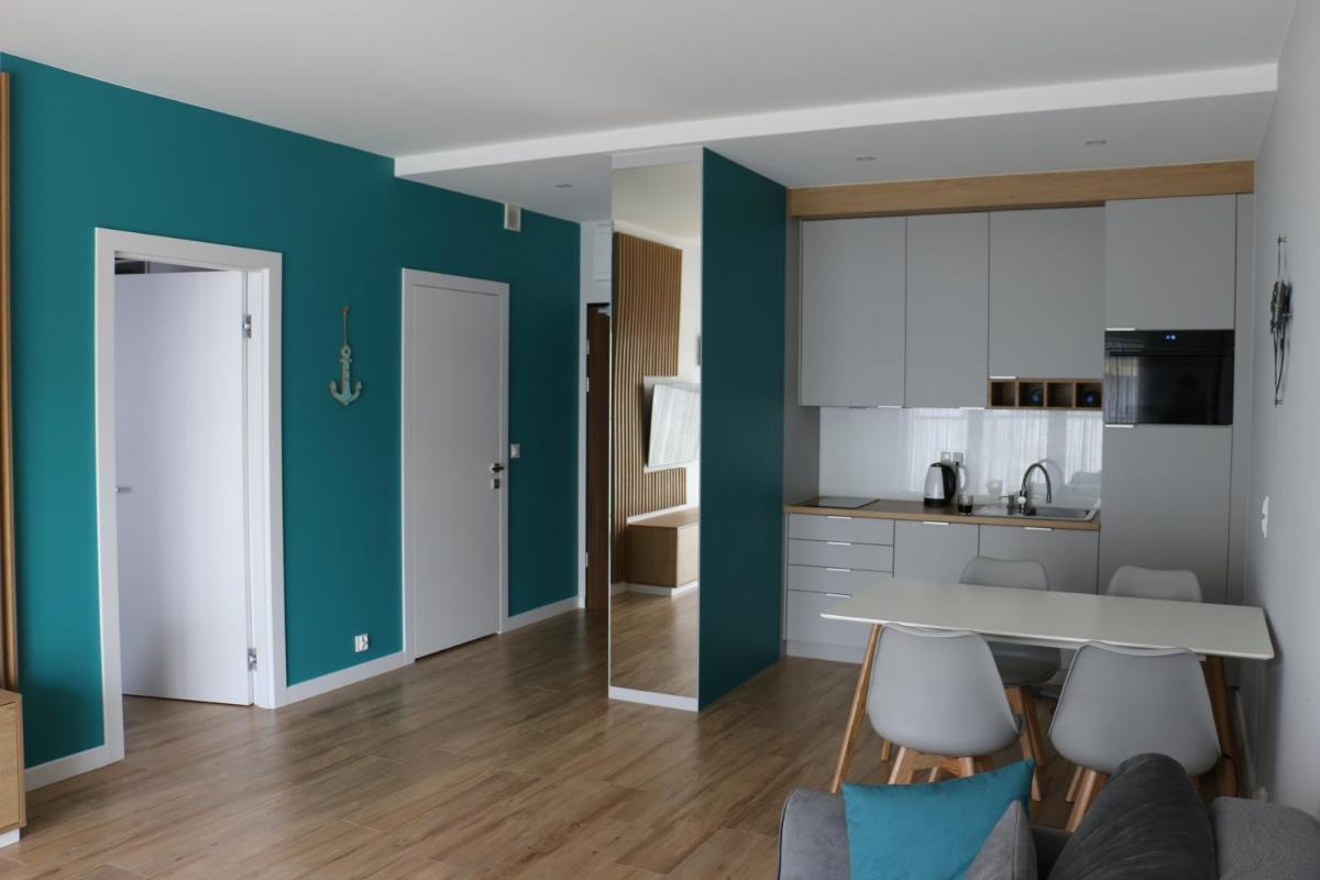 Turkusowa Liwia - Housity
