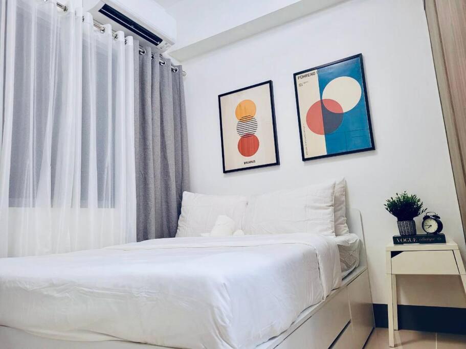 Fame Residence Along EDSA mins walk to Ortigas & SM Megamall - Housity