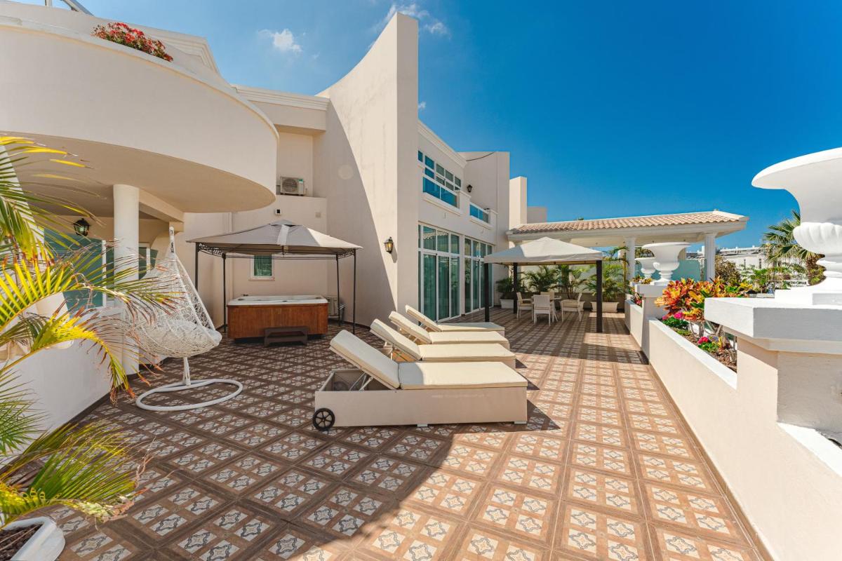 Un balcón o terraza de Flamingo Suites Boutique Hotel