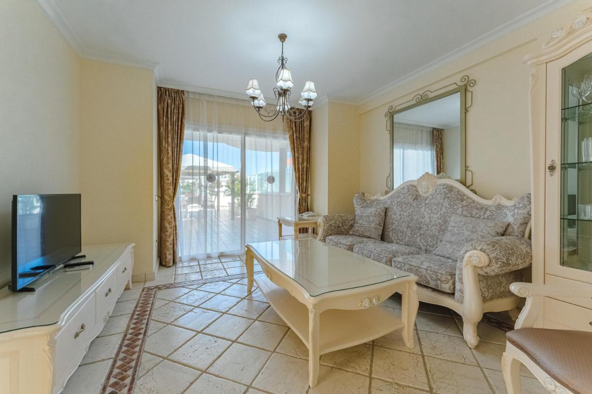 Zona de estar de Flamingo Suites Boutique Hotel