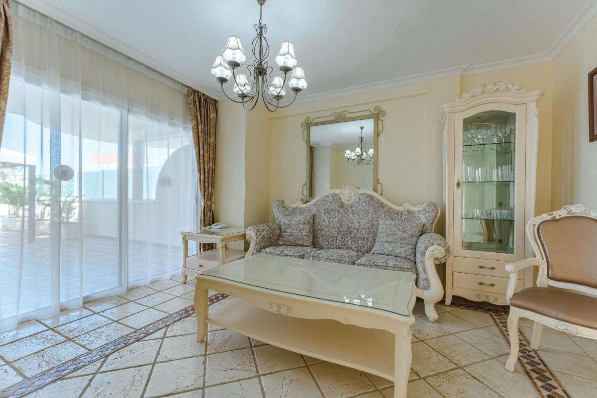 Zona de estar de Flamingo Suites Boutique Hotel